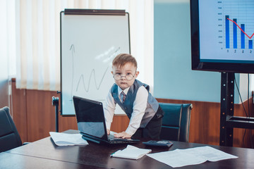 Children businessmen are meeting in the office