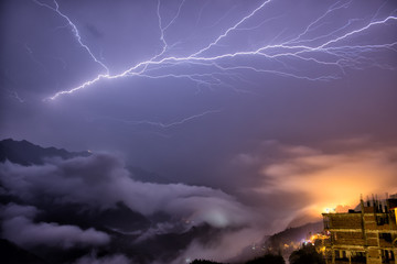 Lightning during the thunderstorm in Sa Pa mountains, Northern Vietnam.