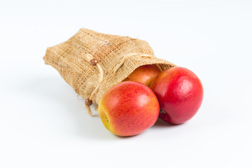 Apples in sack on white background