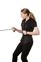 woman pulling a telephone wire