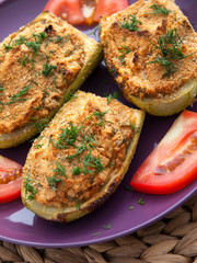 Stuffed zucchini with meat, cheese and vegetables. Shot from above, vertical view