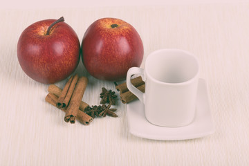 apple cinnamon and empty cup