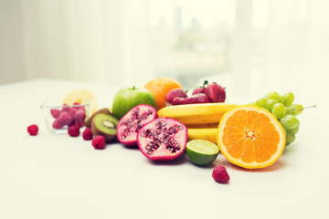 close up of fresh fruits and berries on table