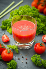 fresh organic tomatoes and tomato juice with parsley. the detox