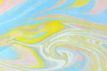 Ebru art. Traditional Turkish Ebru technique. Marbling painting on water transferred on highly textured paper or cloth. Color paint ebru with waves and tile pattern.