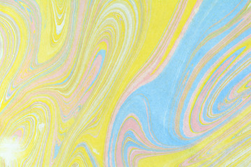 Ebru art. Traditional Turkish Ebru technique. Marbling painting on water transferred on highly textured paper or cloth. Color paint ebru with waves and tile pattern.