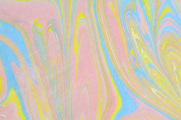 Ebru art. Traditional Turkish Ebru technique. Marbling painting on water transferred on highly textured paper or cloth. Color paint ebru with waves and tile pattern.