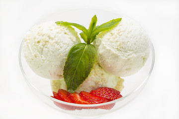 ice cream with caramel sauce and mint on a white background