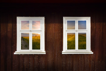Sunset with a white wooden window
