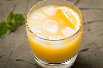 Orange juice in glass with mint, fresh fruits. selective focus,