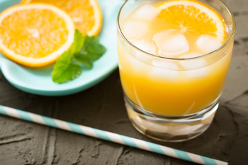 Orange juice in glass with mint, fresh fruits. selective focus,