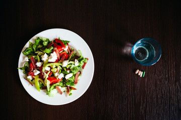 green salad with pills