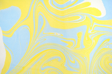 Yellow liquid ink. Creative artistic design. Ebru abstract illustration. Marbling texture. Decorative background. Flowing acrylic paints. Ebru art. Traditional Turkish technique.