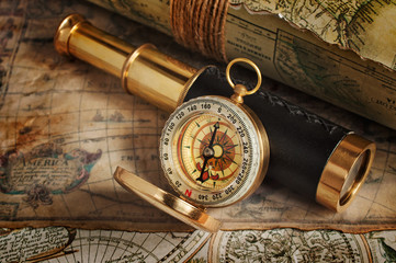 Vintage compass, telescope and map