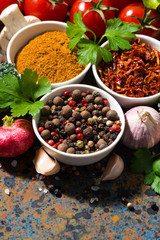 assortment of spices and fresh organic vegetables, closeup 