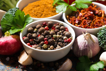assortment of spices and fresh organic vegetables, closeup, sele