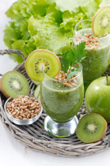 healthy green smoothie with sprouts and fresh ingredients
