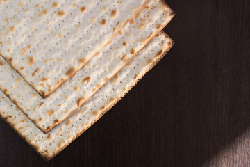 Matzo on brown background