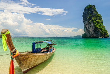 Thai Long Tail Boat Floating Nearby Island With Big Rock