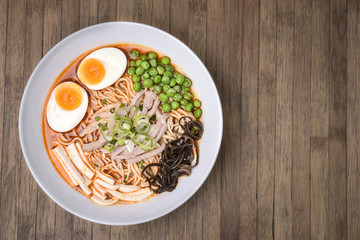 Spicy Tom Yum, Creamy Pork Ramen with Egg, Sugar Pea, Tofu and M