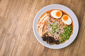Spicy Tom Yum, Creamy Pork Ramen with Egg, Sugar Pea, Tofu and M