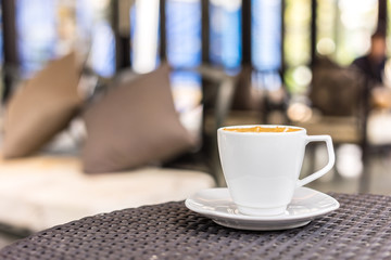Coffee cup on table ,mocca ,soft focus