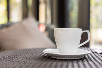 Coffee cup on table ,mocca ,soft focus
