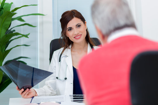 Female Doctor Talking To Her Patient