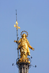 Statue of Madunina on top of the Duomo Milan Italy