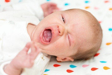 Newborn baby screaming in pain with colic