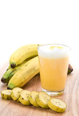 Fresh banana milk shake and banana pieces