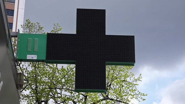 Street LED Pharmacy Cross Sign, Tilt Camera. The green cross is internationally recognised as the universal symbol of the pharmacy. LED Pharmacy Cross is a very effective communication tool