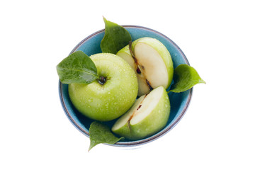 green apples served in a bowl.