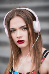 beautiful girl listening to music with headphones