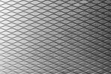 the wave line pattern texture of the rubber background in black
