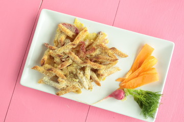 Macaroni coated with egg