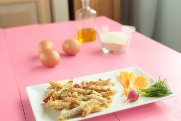 Macaroni coated with egg