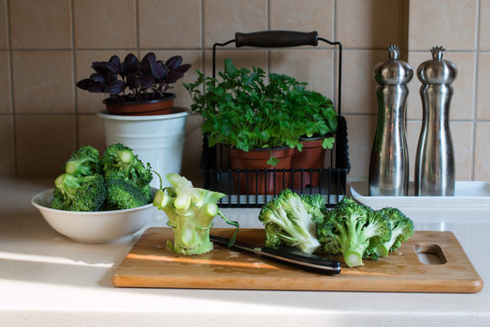 Fresh raw broccoli on the kitchen table.