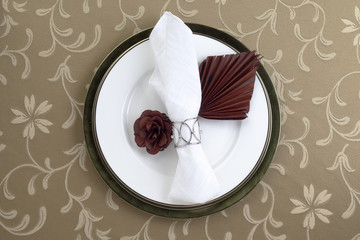 white table napkin in plate