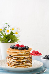 Pancake with blueberries and raspberries 