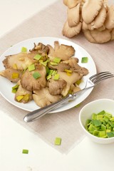 Oyster mushroom wiht leek on the plate