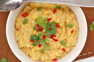Pease pudding with coriander and chilli in the bowl
