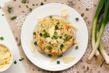 Millets with vegetables, spring onion and cheese
