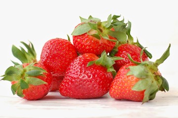 Strawberries on the wooden background