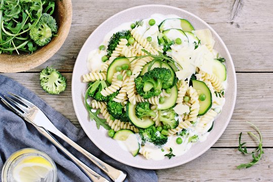 Pasta with broccoli,zucchini and green pea.Selective focus 