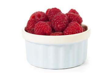 raspberries in a container