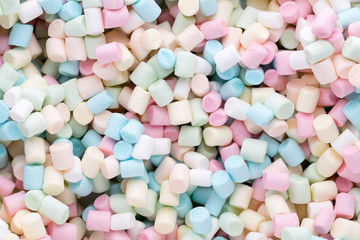 Background or texture of colorful mini marshmallows.