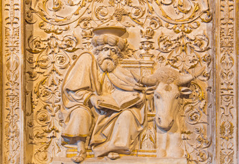 Fototapeta na wymiar AVILA, SPAIN, APRIL - 18, 2016: The relief of St. Luke the Evangelist in Girola of Catedral de Cristo Salvador.