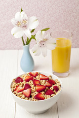 cereals with strawberries and juice