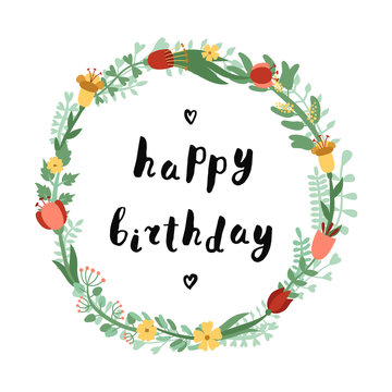Happy birthday ink handwritten lettering illustration with floral circle frame.